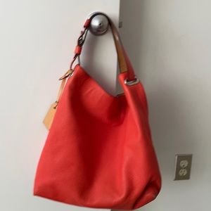 Rees Krakoff orange hobo.